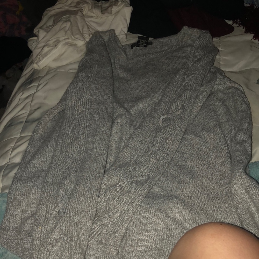 Grey cardigan with braids down the sleeves